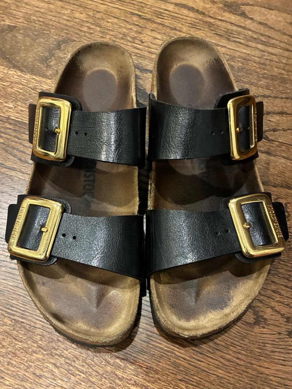 Birkenstock Black Two-Strap Sandals with Gold Buckles